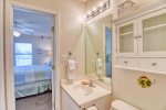 For your convenience and privacy, the bath has two separate vanity areas plus a shared shower area.
